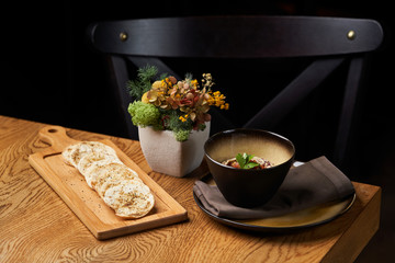 Baba ganoush hummus with eggplant on wooden table background.
