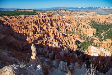 The spectacle of thousands of glowing orange earthen spires concentrated in the valley below the...