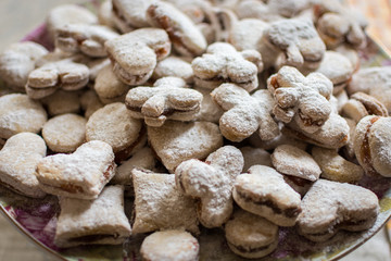 Vanilice (small Vanilla cookies) are bite-sized Serbian Vanilla cookies made as sandwich of two vanilla and walnut cookies held together with a dollop of jam, usually served around the Christmas