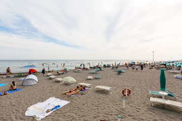 JULY 22, 2019 - GRADO, ITALY - Bathing beach of the upper Adriatic sea at Grado, Northeastern Italy
