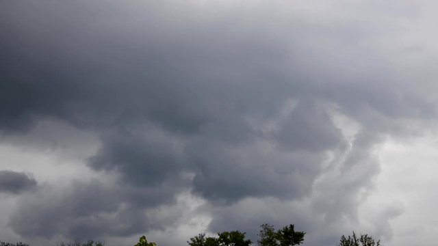 Dark rolling clouds time lapse.