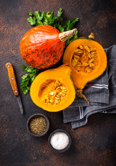 Halves of hokkaido pumpkin with spices