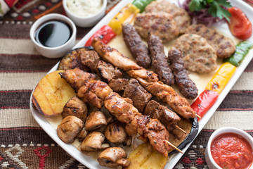 Middle Eastern Style Assorted Grilled Meat, Kebabs, Beef, Lamb, Chicken and Vegetables.
