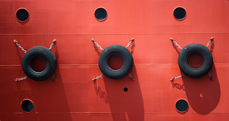 A wheeled put on boats to prevent collisions.