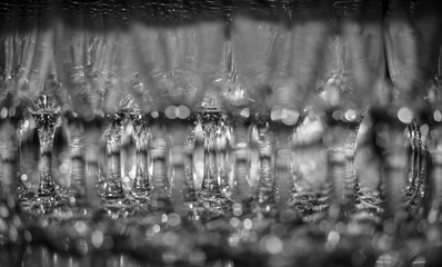 Many empty glasses of champagne background