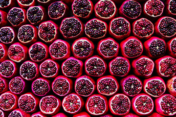 Red, juicy grenades on the market on the wind. Grenades for juice in Tel Aviv on the market.