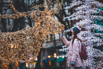Christmas decorations in the historical center streets of Helsinki, with evening light...
