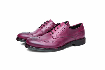 Pair of male purple leather shoes on white background, isolated product, top view.