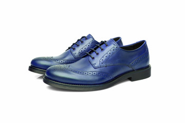 Pair of male cyan and black leather shoes on white background, isolated product, top view.
