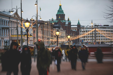 Obraz premium Christmas decorations in the historical center streets of Helsinki, with evening light illumination, concept of Christmas in Finland, with Cathedral, market square, christmas tree