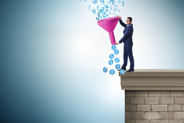 Data monetization concept with funnel and businessman