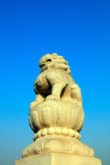 Fototapeta na wymiar Carved stone lion