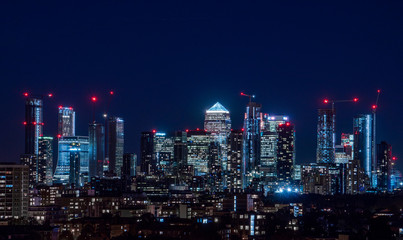 London / United Kingdom - October 4th 2019: Night panorama of the Canary Wharf financial district...
