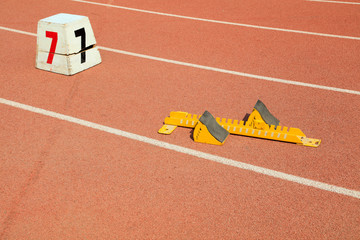 starting block and track number on plastic playground