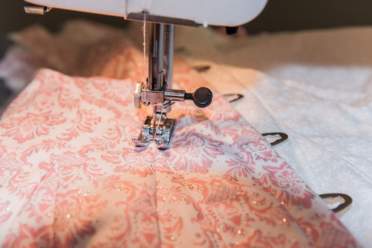 sewing machine on pink patterned fabric