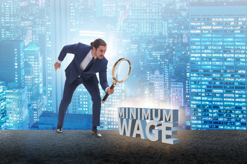 Concept of minimum wage with businessman