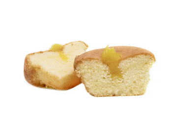 half  vanilla cup cake isolated on white background
