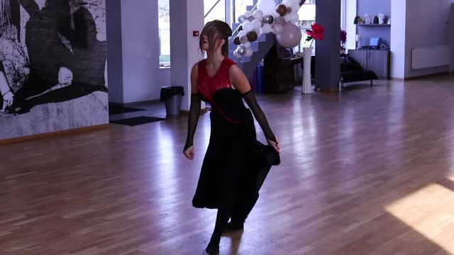 Female dancer stretching before dancing