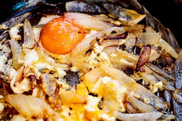 Pan fried eggs and chopped onions prepared in a light olive oil - great with crispy fresh bread.