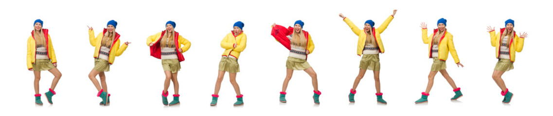 A girl in bright winter clothes isolated on white