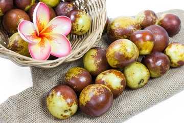 closeup chinese jujube in wicker baskets isolated on white background