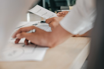 user experience UX designer designing web on smart phone layout. UI developer planning working on mobile application prototype