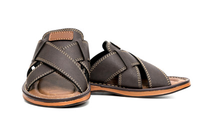 Brown leather slippers isolated on white background