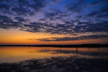 Fototapeta na wymiar Sunset reflected on a lake
