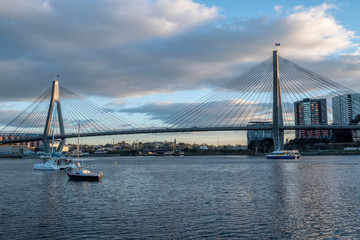 Fototapeta na wymiar bridge and yacht in the morning light