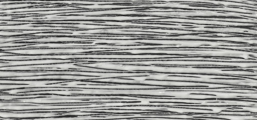 Abstract pattern. White liquid lines on a black background.