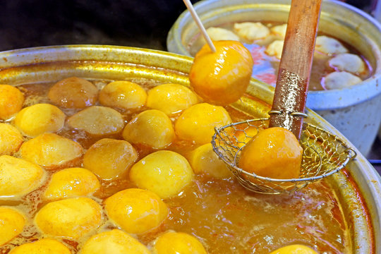 yellow cooked curry fishball fast food in Hong Kong street