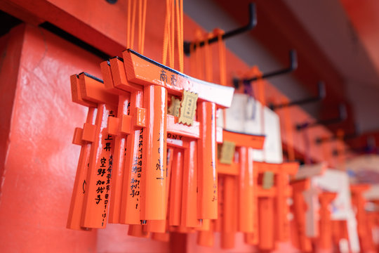 Kyoto, Japan - March. 22, 2019: Beautiful ema (Shinto, picture-horse) with wishes in Fushimi Inari Taisha shrine temple, prayer from people