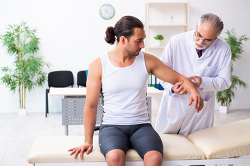 Young male patient visiting experienced doctor
