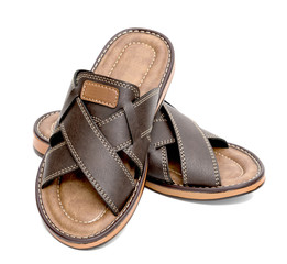 Brown leather slippers isolated on white background