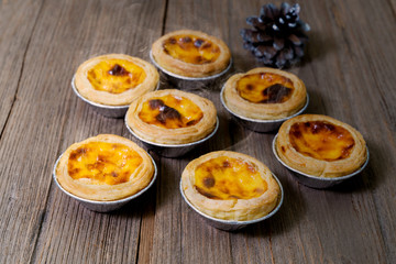 egg tart in aluminum foil cup with smoke