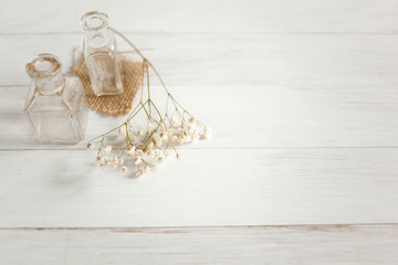 Baby’s breath flowers on white wood background with copy space
