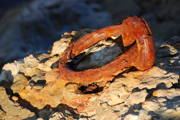 An old rusty dock mooring ring