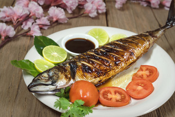 Grilled Mackerel Fish with sauce and vegetables