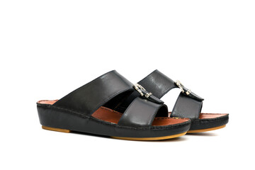 Black leather slippers isolated on white background