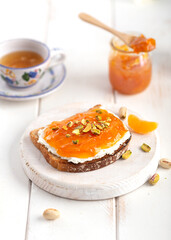 Orange or mandarin Jam on a white background