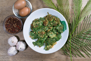 Fried Egg With Climbing Wattle or cha-om omelettes,Thai food
