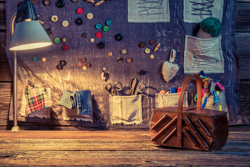 Sewing mat with threads and buttons in tailor workshop