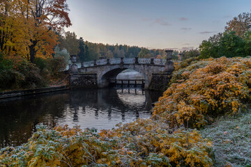Fototapeta na wymiar Slavyanka river in Pavlovsk Park frosty autumn morning. Pavlovsk, Saint Petersburg, Russia