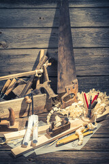 Closeup of vintage carpenter drawing desk in rustic wooden shed