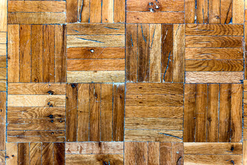 Fragment of old wooden parquet floor