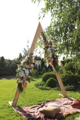 wooden triangular arch for photo shoot in the Park