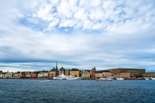Ferry and boats for tourist trips along the quay of Gamla Stan ,  Stockholm, Sweden