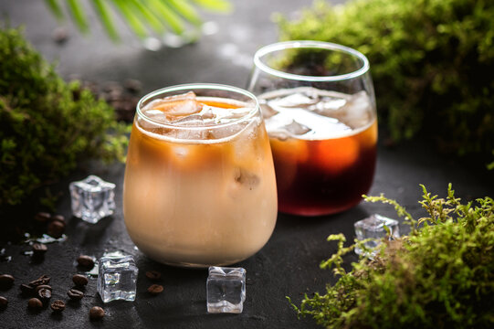 Iced coffee in a glass with cream