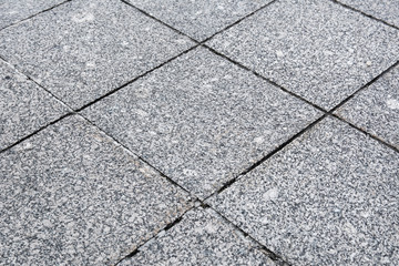 The texture of granite paving slabs