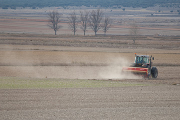 Tractor working in the field. Gallocanta Lagoon Natural Reserve. Aragon. Spain.